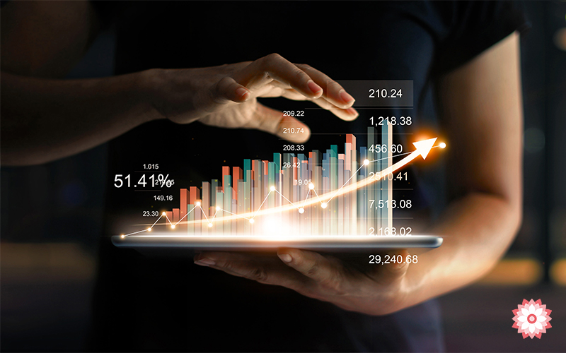Businessman Holding Tablet With Growing Virtual Hologram Of Statistics